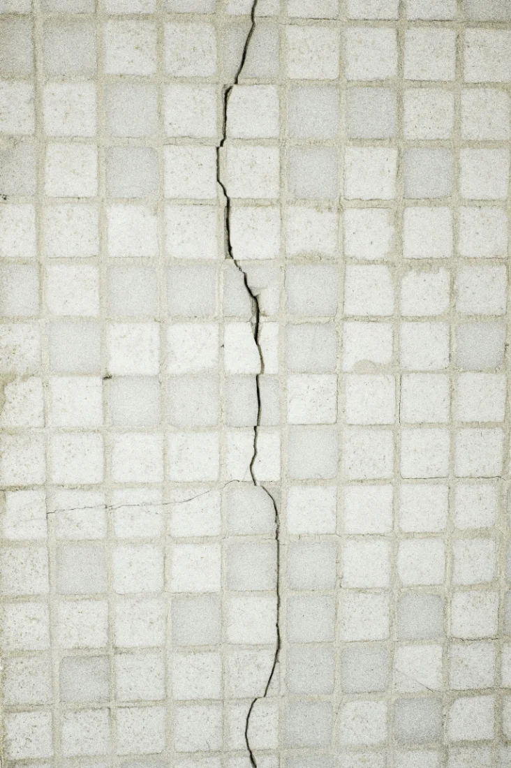 Cracked floor tile captured on site